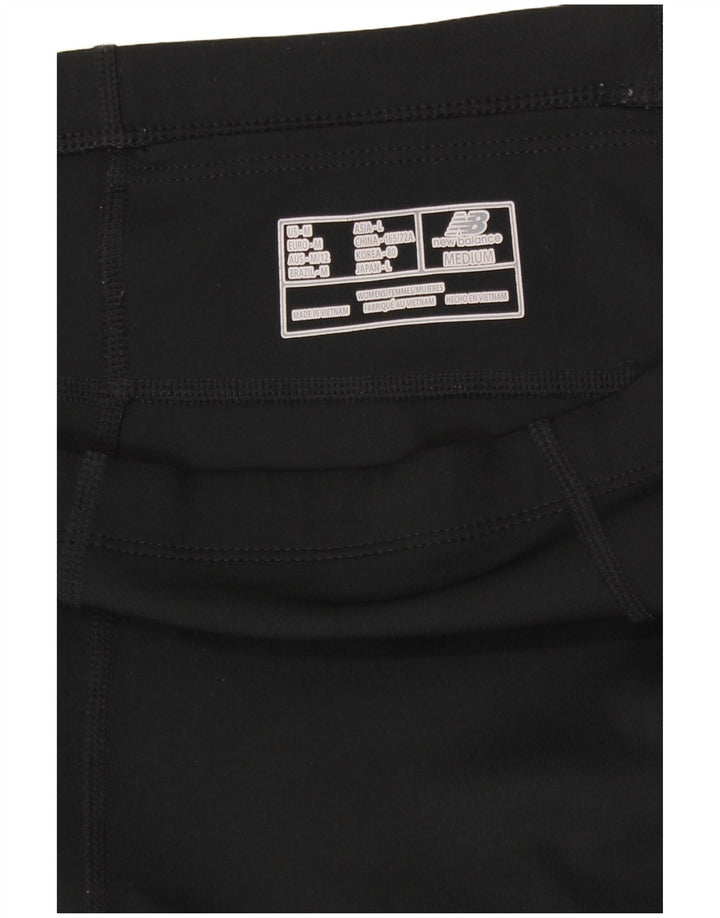 Leggings femininos New Balance UK 14 médio preto colorblock poliéster