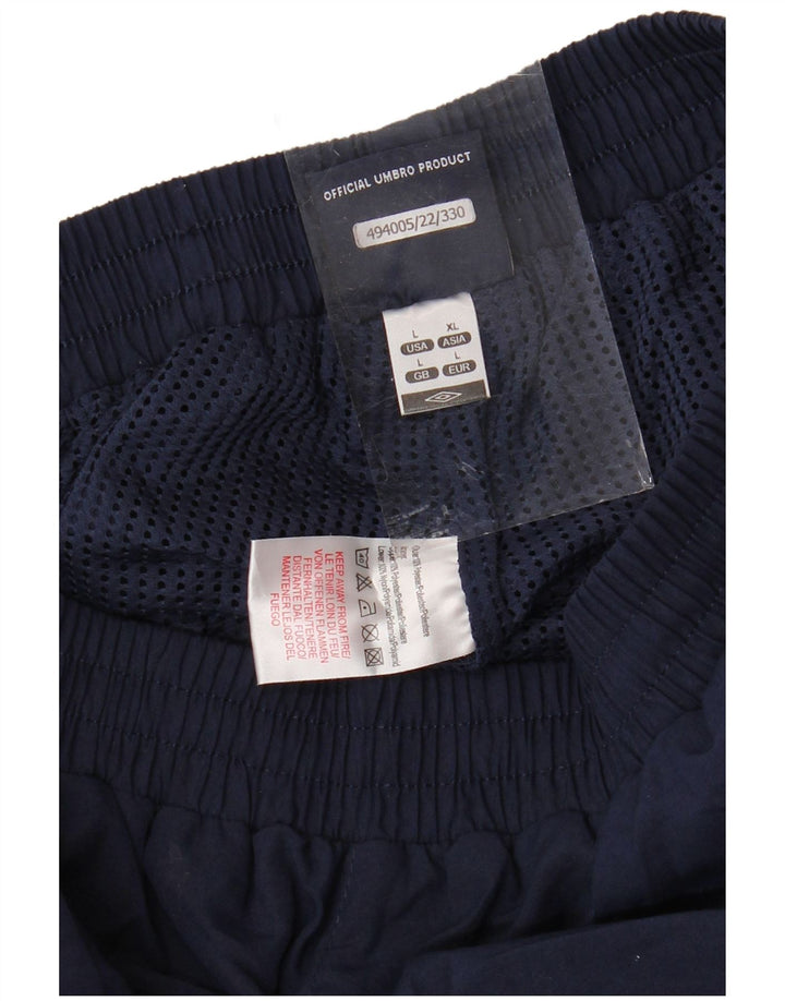 Calça de treino masculina UMBRO com estampa gráfica grande poliéster azul marinho