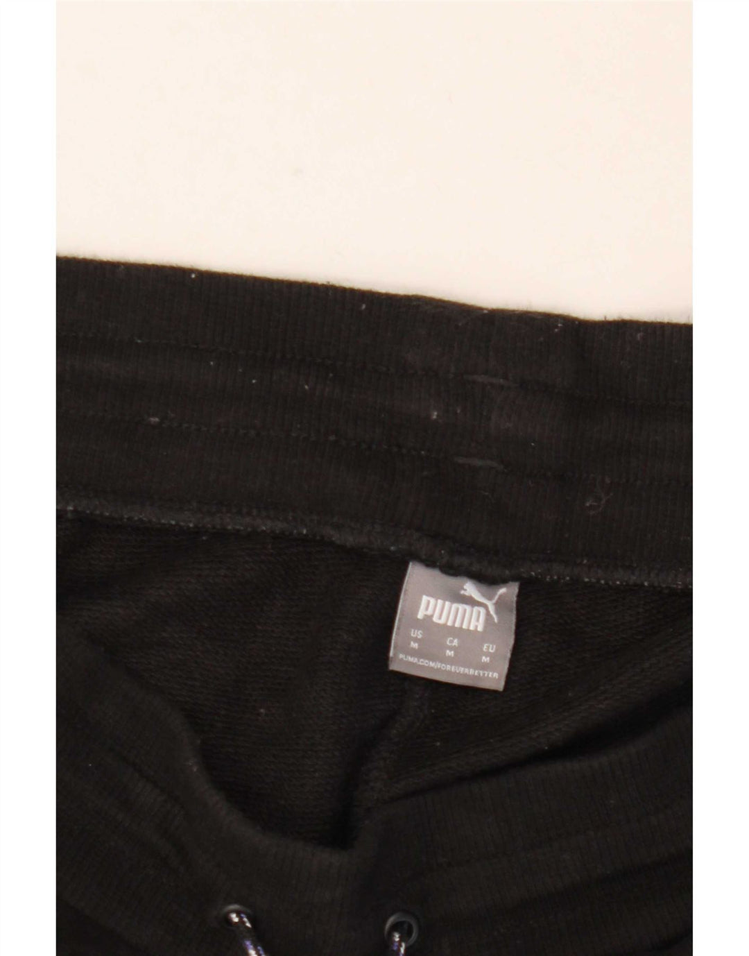 Calça de treino masculina Puma Joggers médio preto com estampa animal