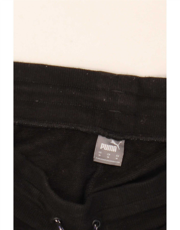 Calça de treino masculina Puma Joggers médio preto com estampa animal