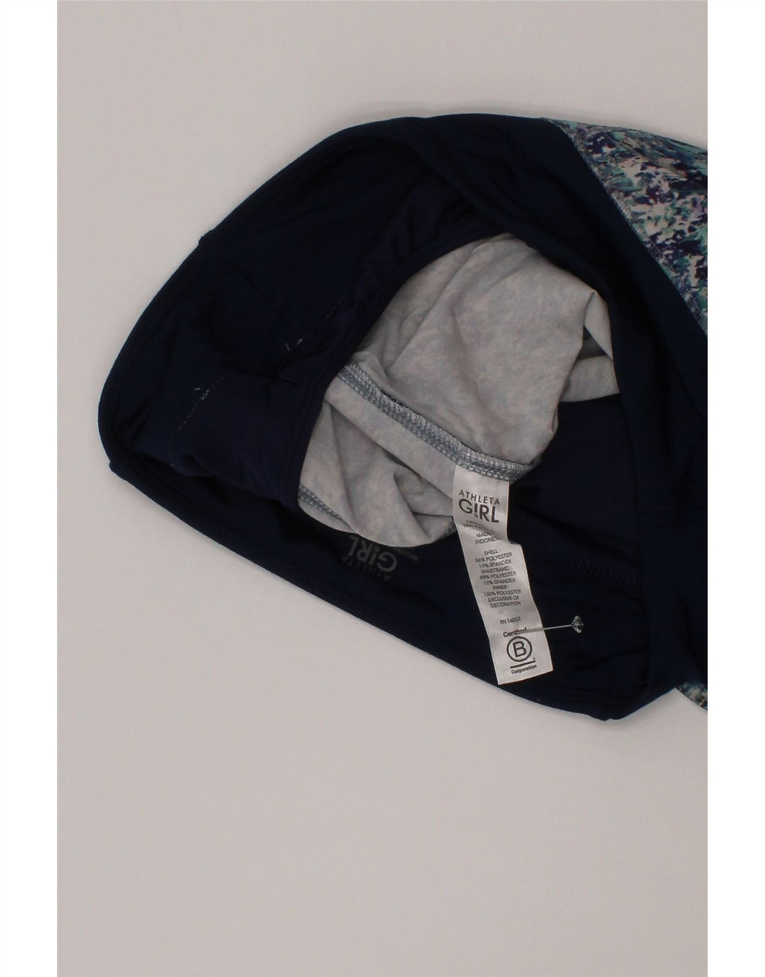 Shorts esportivos com padrão abstrato feminino Athleta 11-12 anos grande azul marinho