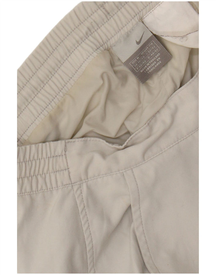 Calça corta-vento masculina NIKE médio W32 L31 branco colorblock