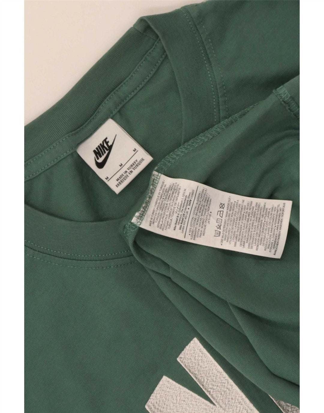 Camiseta gráfica masculina Nike Top médio verde colorblock algodão