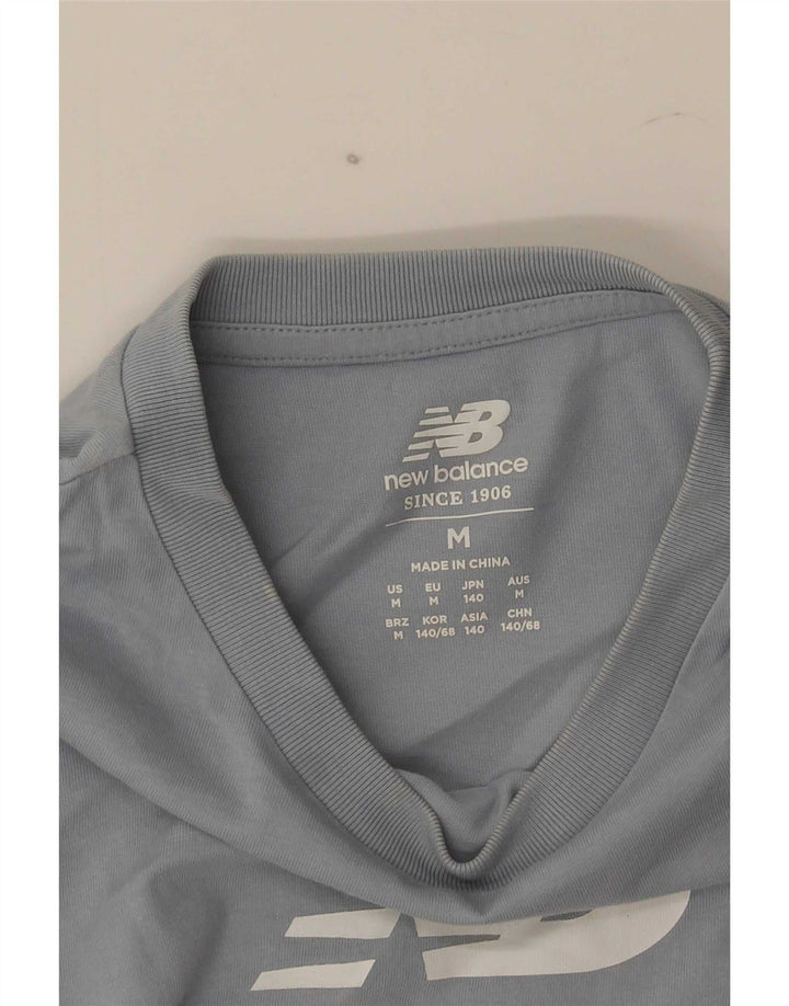 Camiseta gráfica New Balance Boys 9-10 anos azul médio