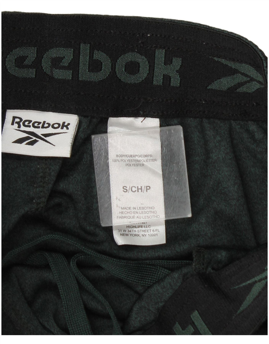Shorts esportivos masculinos Reebok pequeno poliéster manchado verde