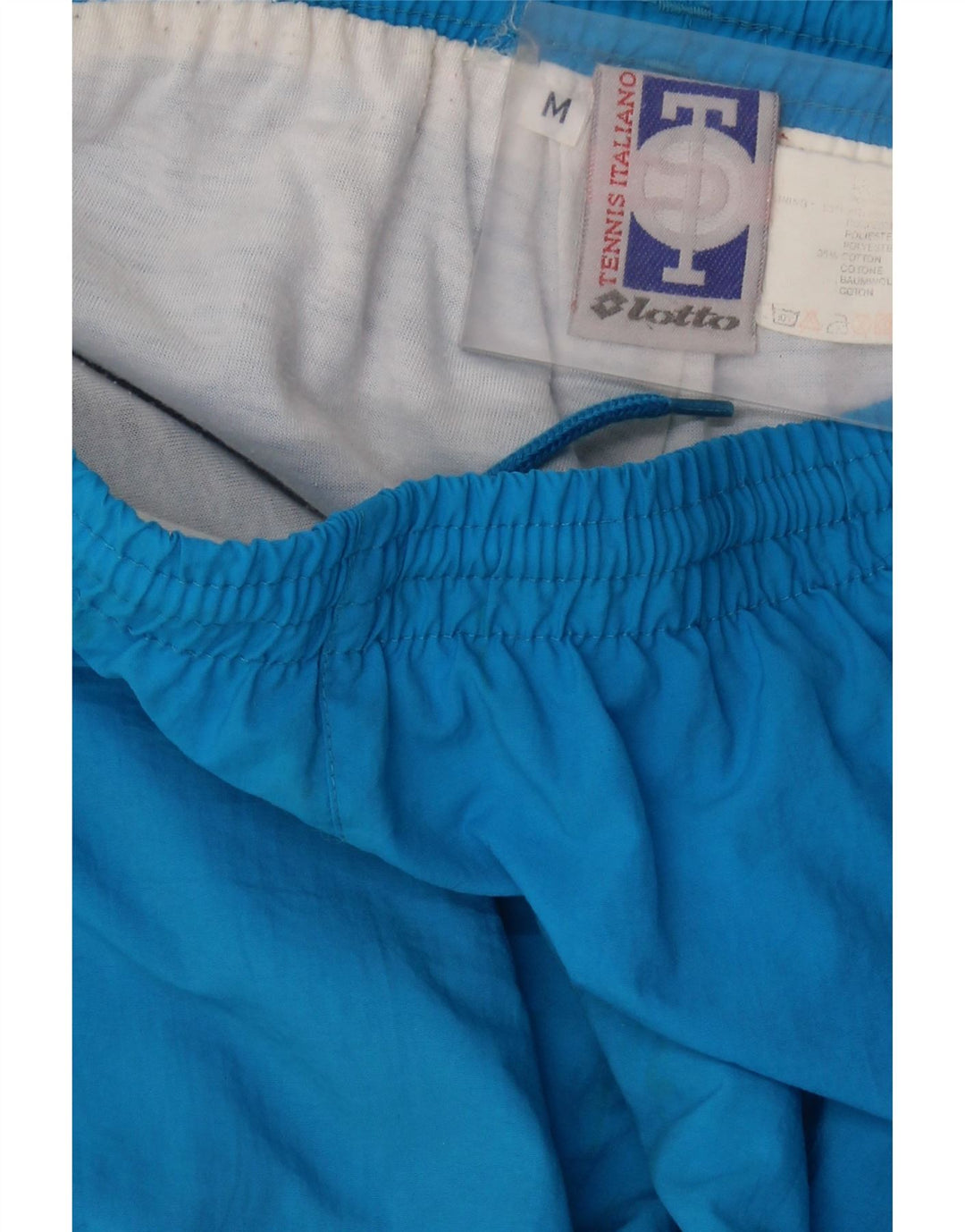 Calça de treino masculina LOTTO de poliéster azul médio