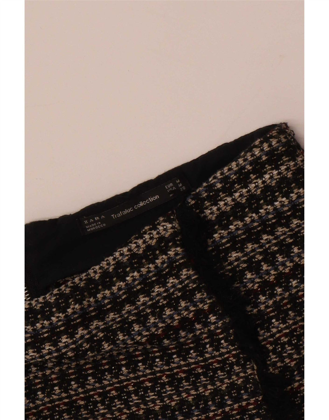 Zara Minissaia feminina Trafaluc média W28 listrada preta