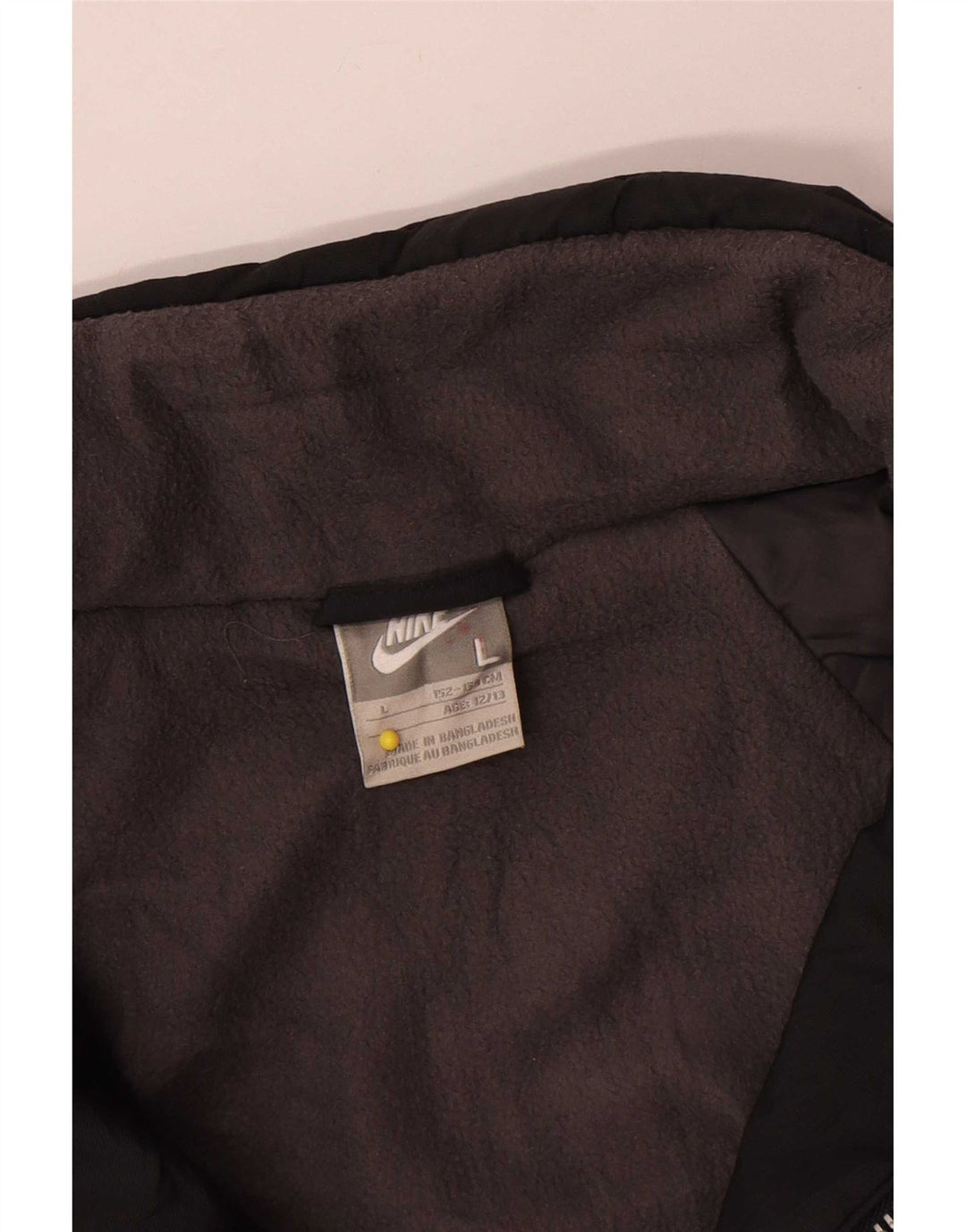 Jaqueta corta-vento Nike Boys Graphic 12-13 anos grande preto nylon