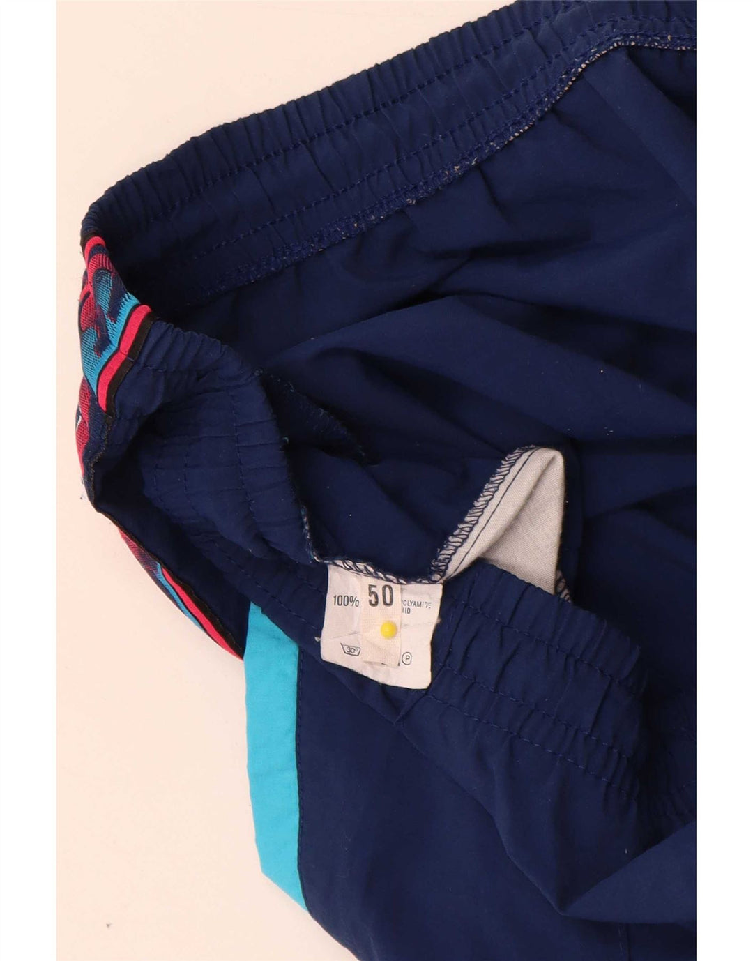 Calça de treino masculina Asics Graphic IT 50 médio azul marinho colorblock