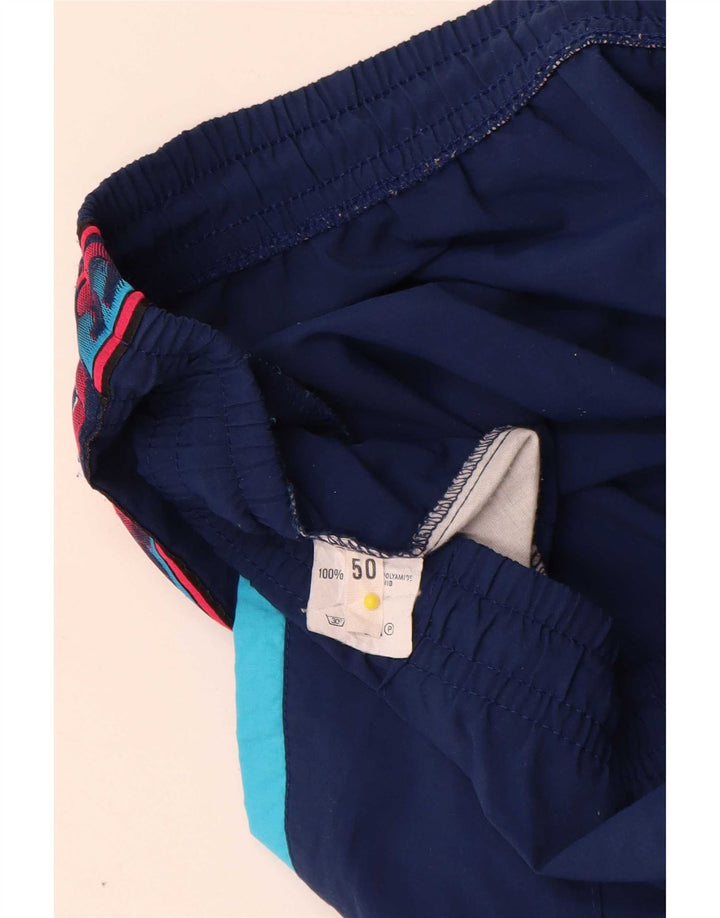 Calça de treino masculina Asics Graphic IT 50 médio azul marinho colorblock