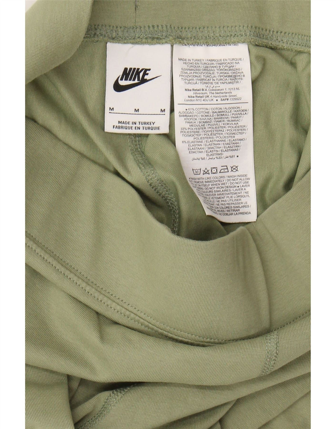 Leggings femininas Nike Graphic UK 12 algodão verde médio