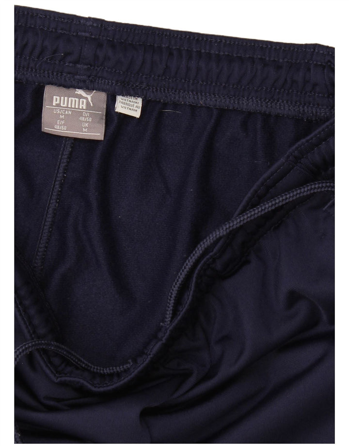 Calça de treino feminina Puma UK 14 médio azul marinho