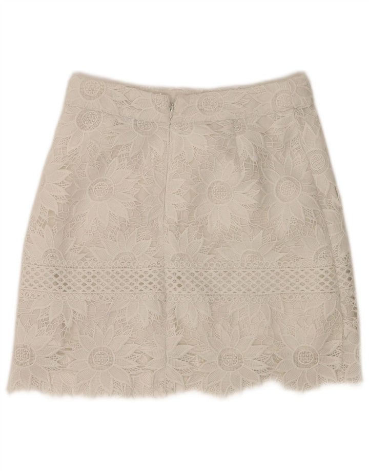 Mini saia feminina Topshop Reino Unido 8 pequena W28 poliéster floral branco