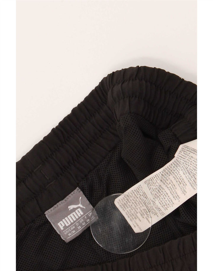 Shorts esportivos femininos Puma UK 12 poliéster preto médio