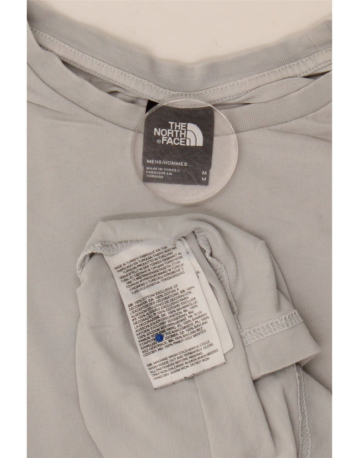 Camiseta gráfica masculina The North Face algodão cinza médio