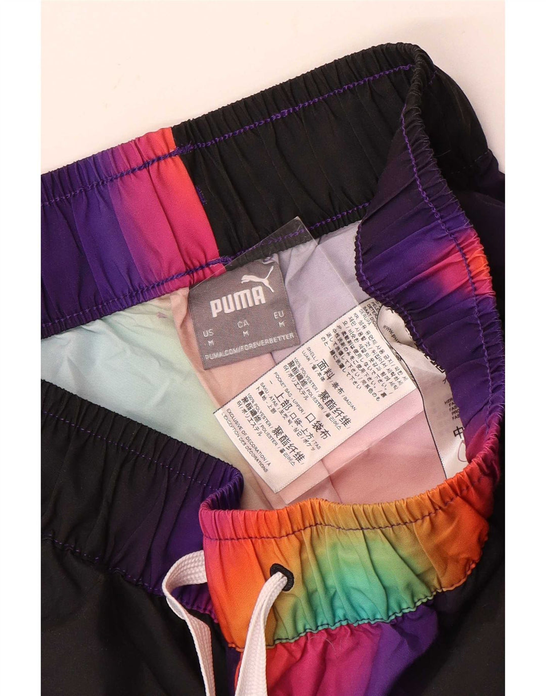 Calça esportiva masculina Puma Graphic, média, multicolorida, tie-dye, poliéster