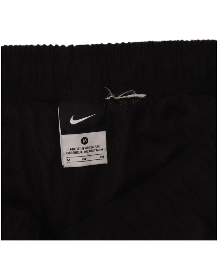 Calça de treino masculina Nike médio preto colorblock