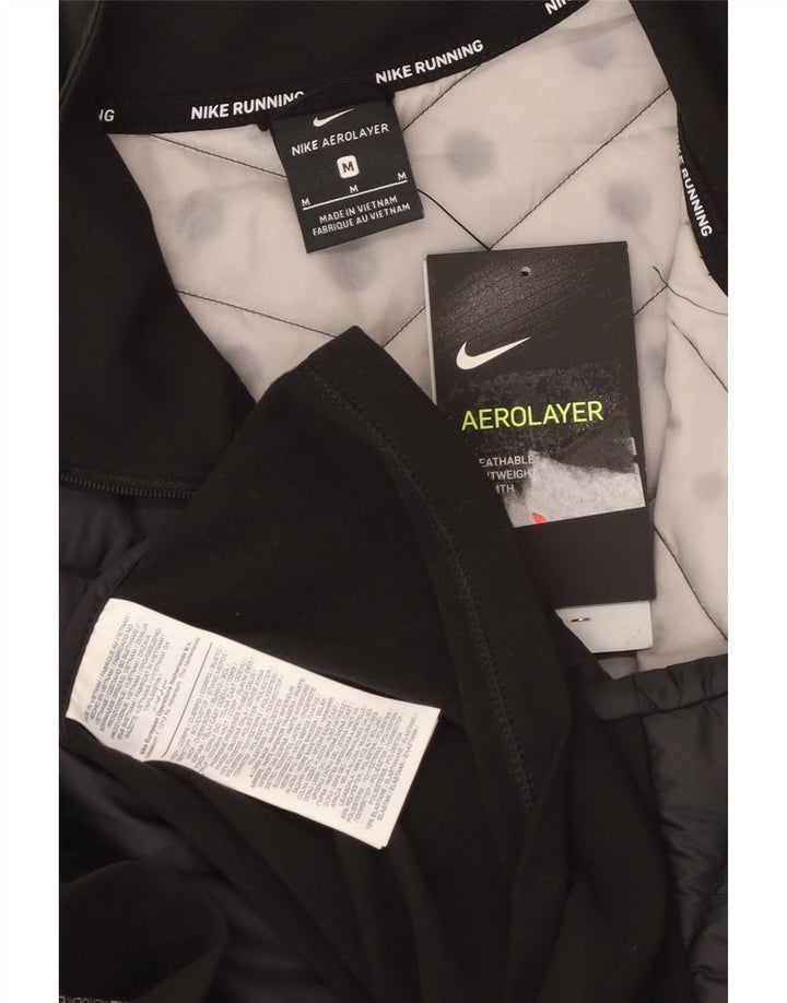 Colete acolchoado masculino Nike UK 38 poliéster preto médio