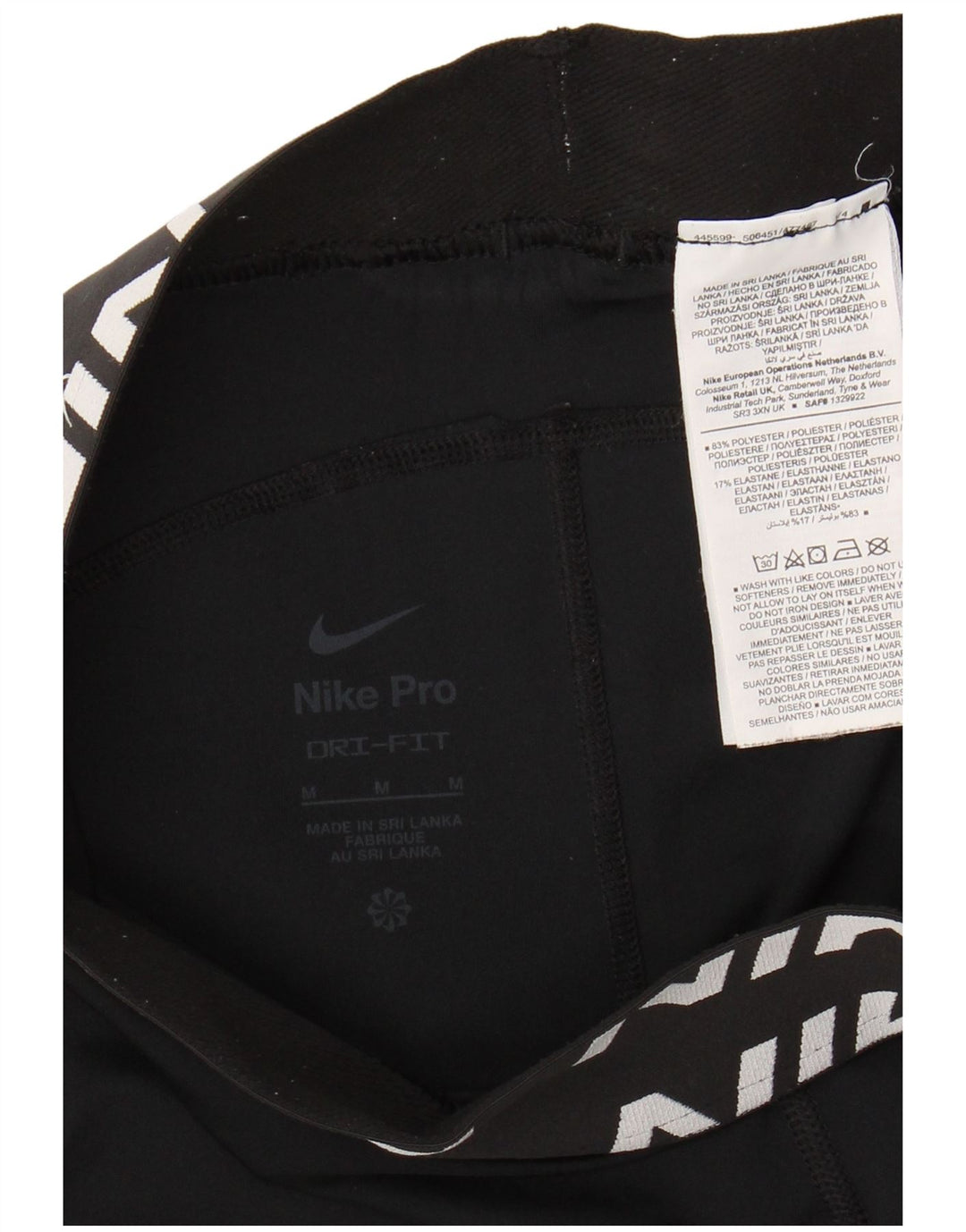 Leggings femininas Nike Dri Fit Graphic UK 12 médio preto poliéster