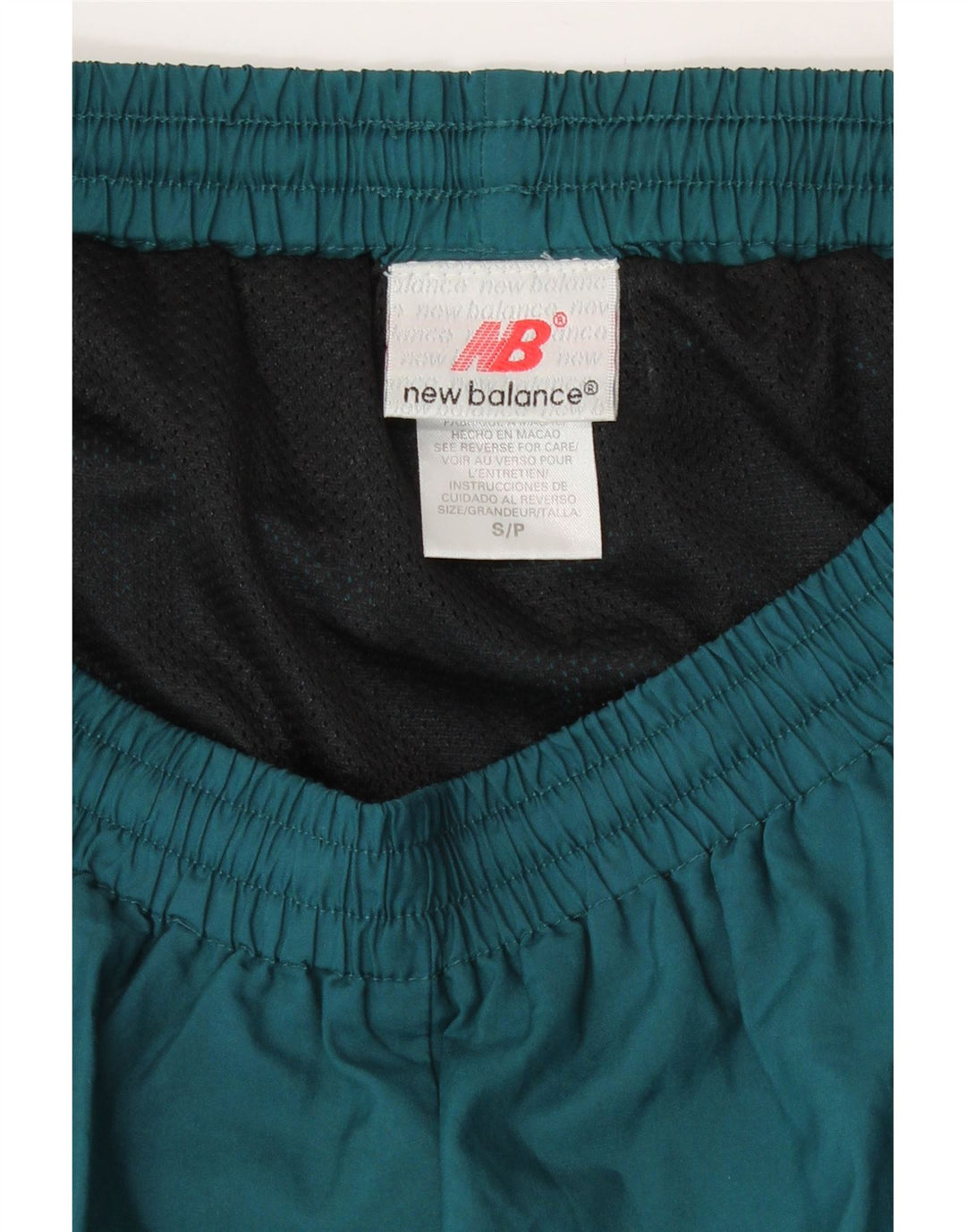 Shorts esportivos femininos New Balance UK 8 poliéster verde pequeno