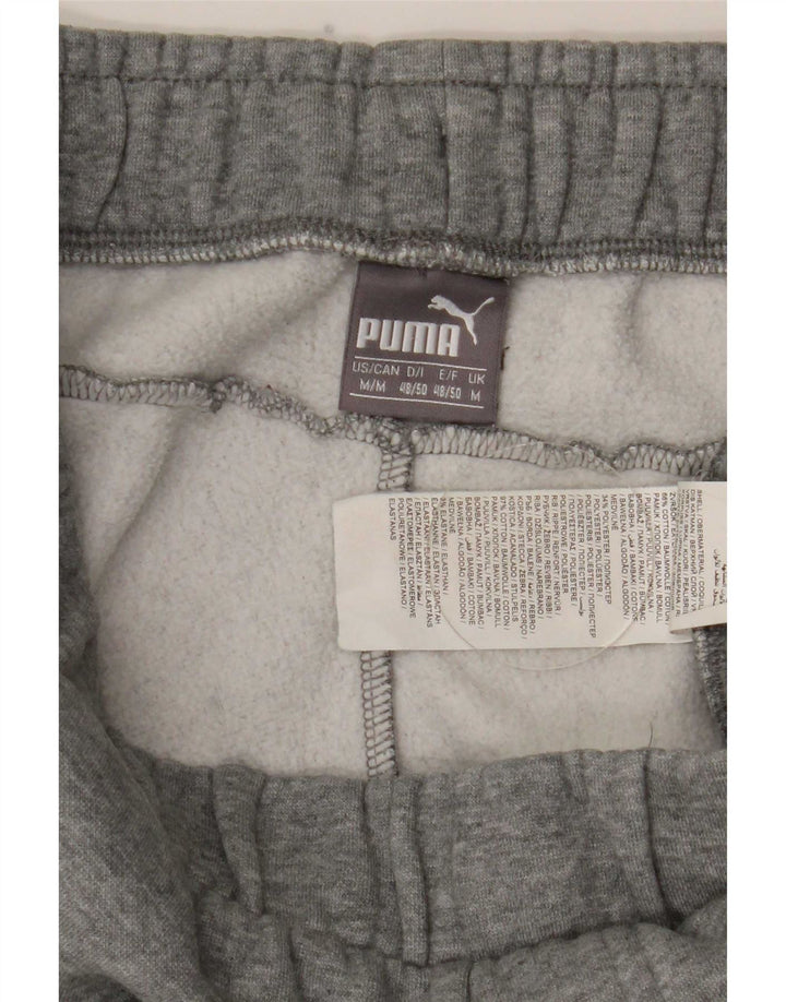 Calça de treino masculina Puma Graphic Joggers cinza médio algodão
