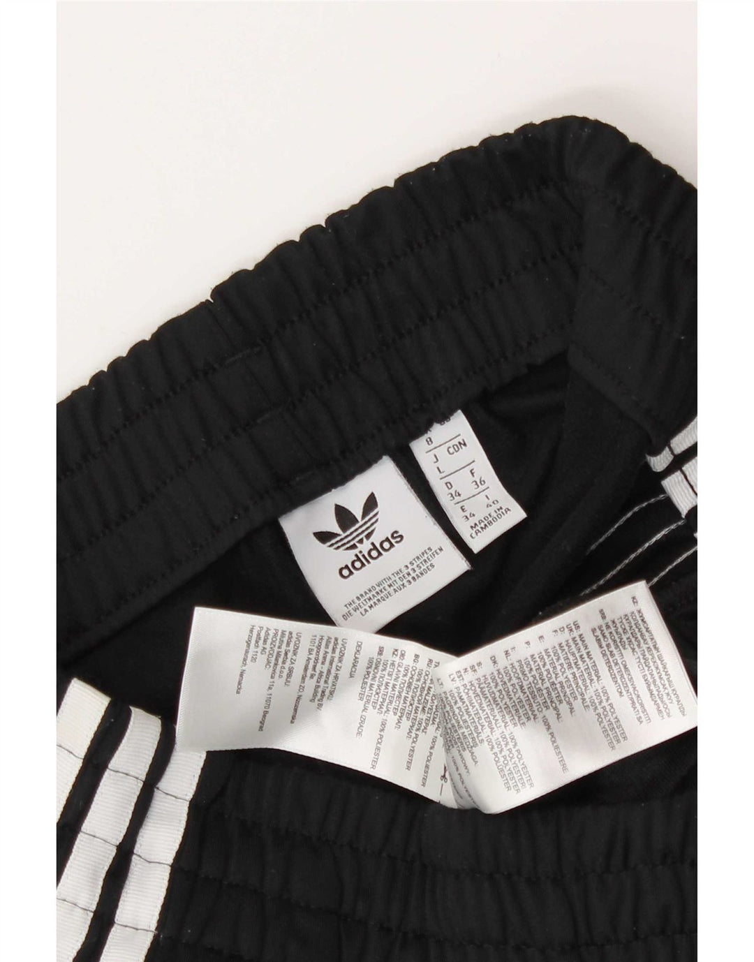 Shorts esportivos femininos Adidas UK 8 pequeno poliéster preto