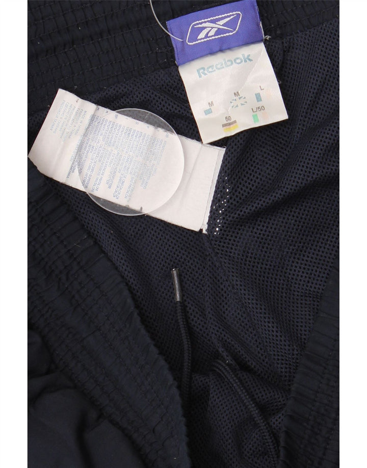 Calça de treino masculina Reebok médio azul marinho poliéster
