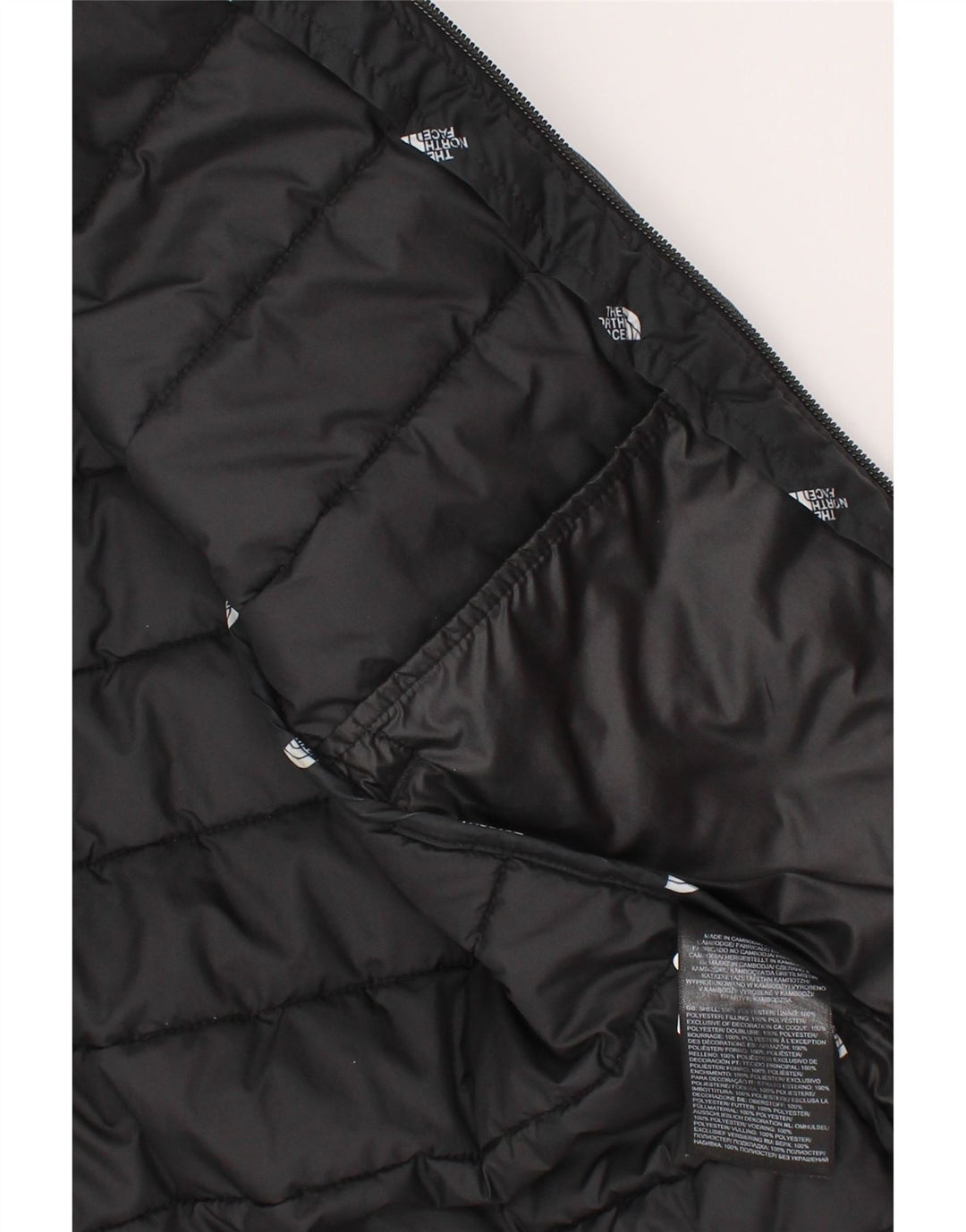 Jaqueta acolchoada com capuz gráfico The North Face Boys 9-10 anos médio preto