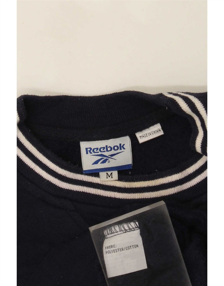 Reebok masculino gráfico moletom jumper médio azul marinho poliéster