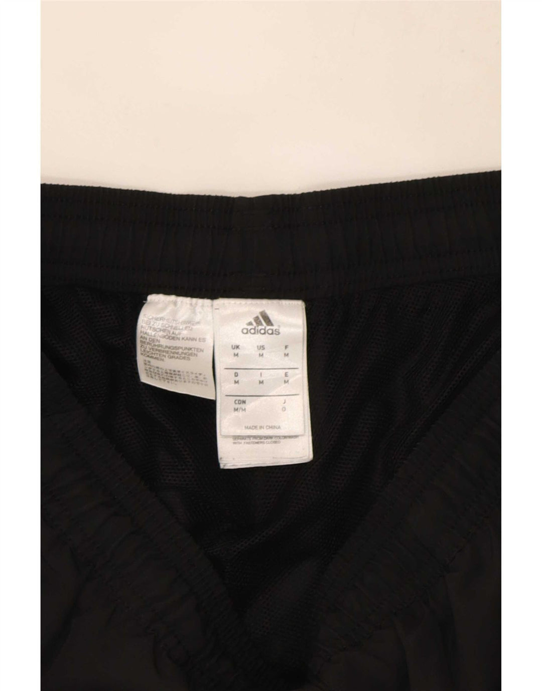Calça de treino masculina Adidas Joggers médio preto colorblock poliéster