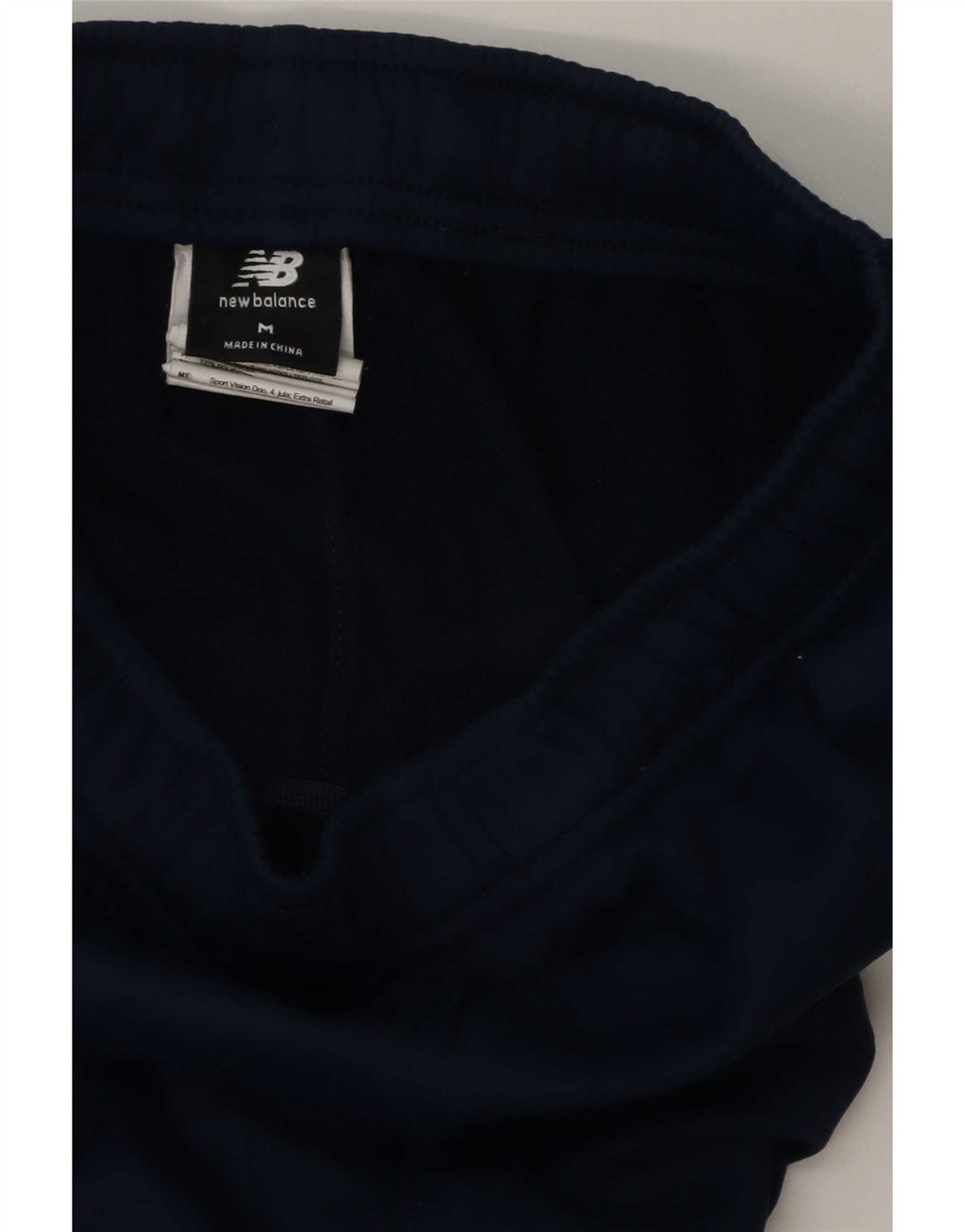 Calça de treino masculina New Balance Graphic azul marinho poliéster