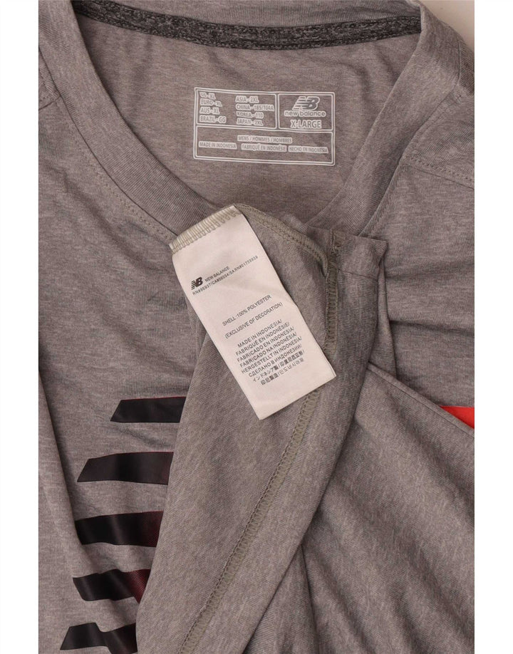 Camiseta gráfica masculina New Balance XL poliéster cinza
