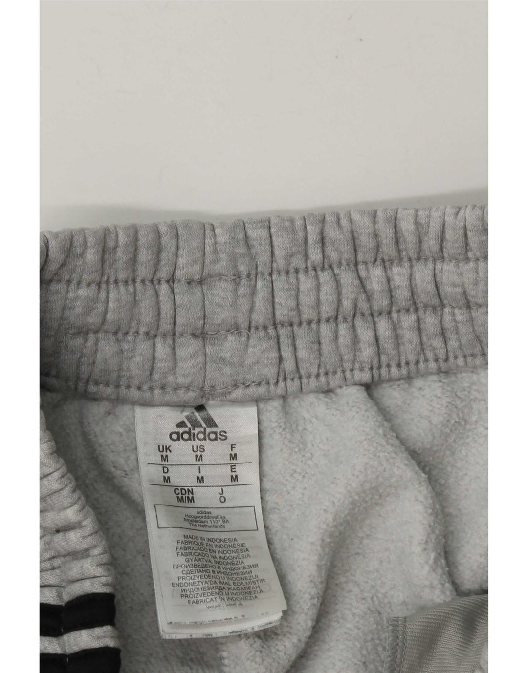 Calça de treino masculina Adidas Joggers cinza médio algodão manchado