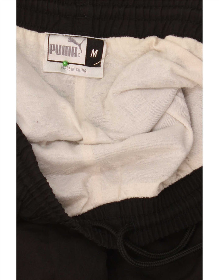 Calça de treino masculina Puma Graphic preto médio poliéster