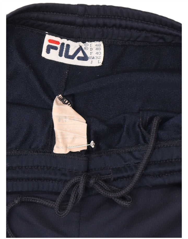 Calça de treino masculina Fila IT 48 poliéster listrado azul marinho médio