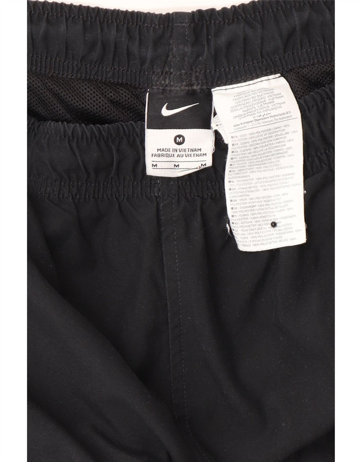 Calça de treino masculina Nike médio preto colorblock poliéster