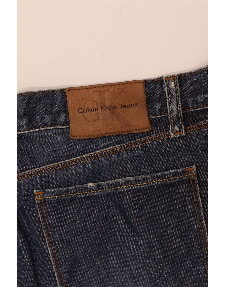 Calça jeans feminina Calvin Klein Bootcut W28 L29 azul marinho