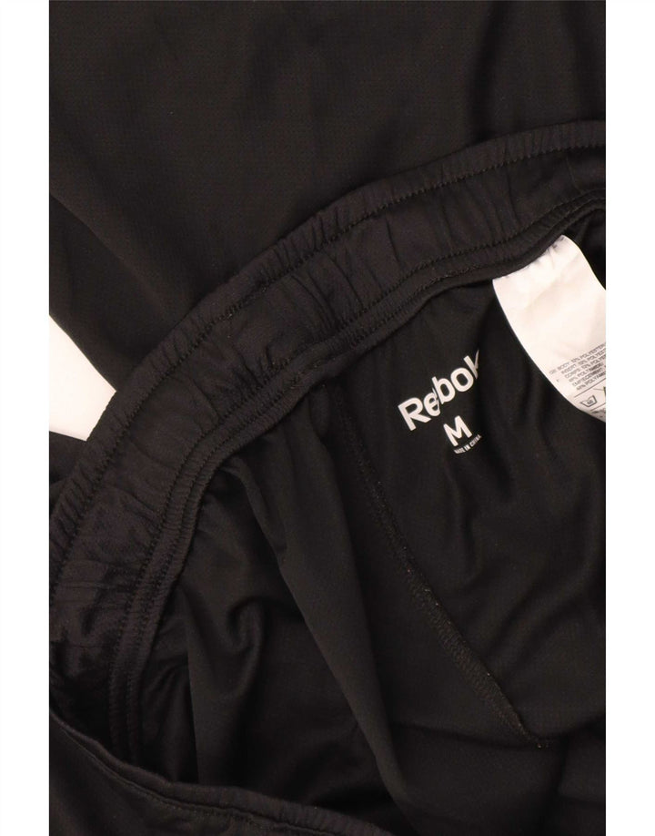 Shorts esportivos masculinos Reebok médio preto poliéster