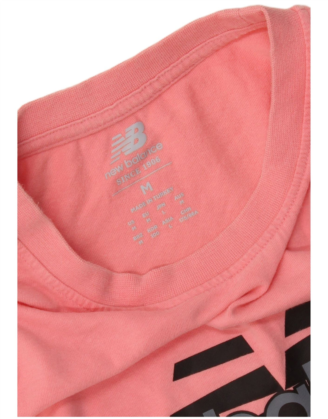 Camiseta gráfica masculina New Balance rosa médio