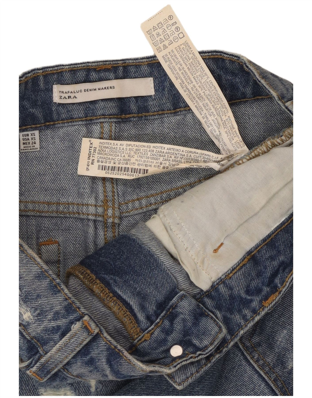 ZARA Mini saia jeans feminina Trafaluc desgastada XS W24 algodão azul