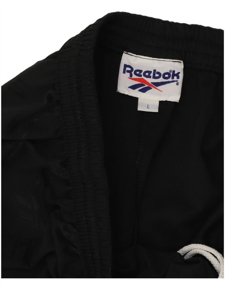Shorts esportivos masculinos Reebok grande poliéster preto