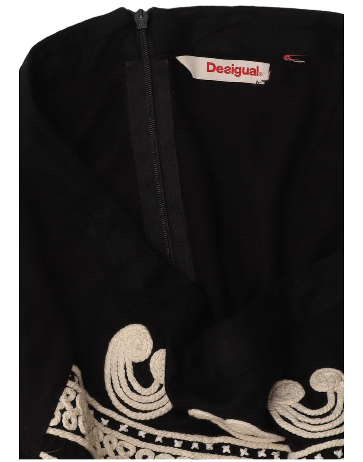 Saia feminina Desigual linha A W34 grande preto paisley