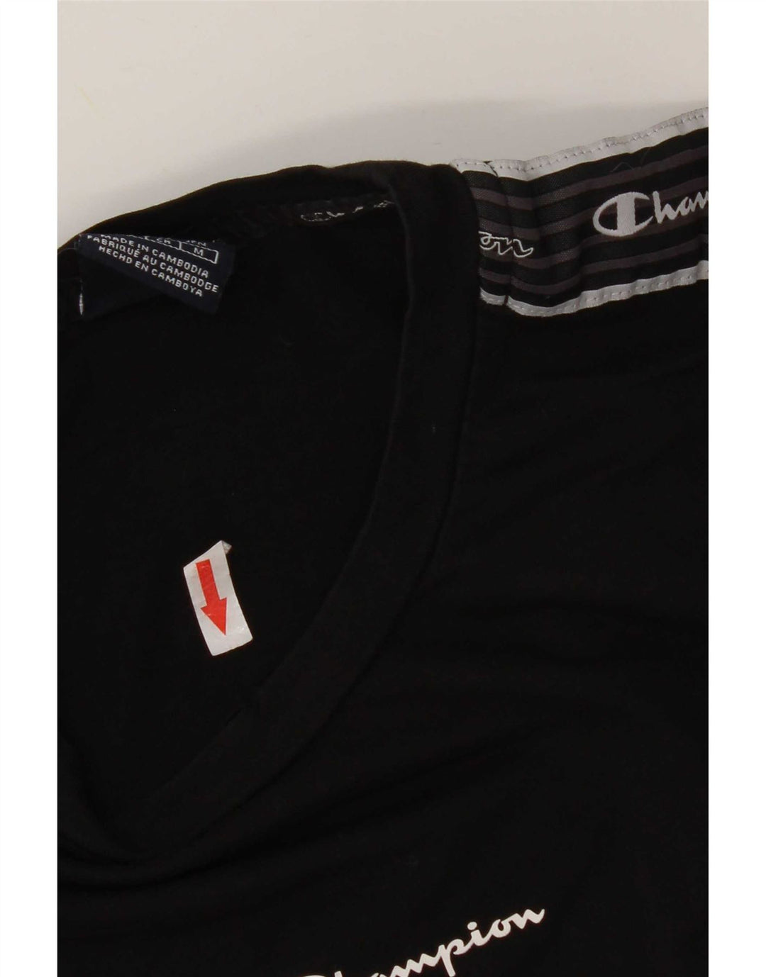 Camiseta feminina estampada Champion UK 10 pequena preta