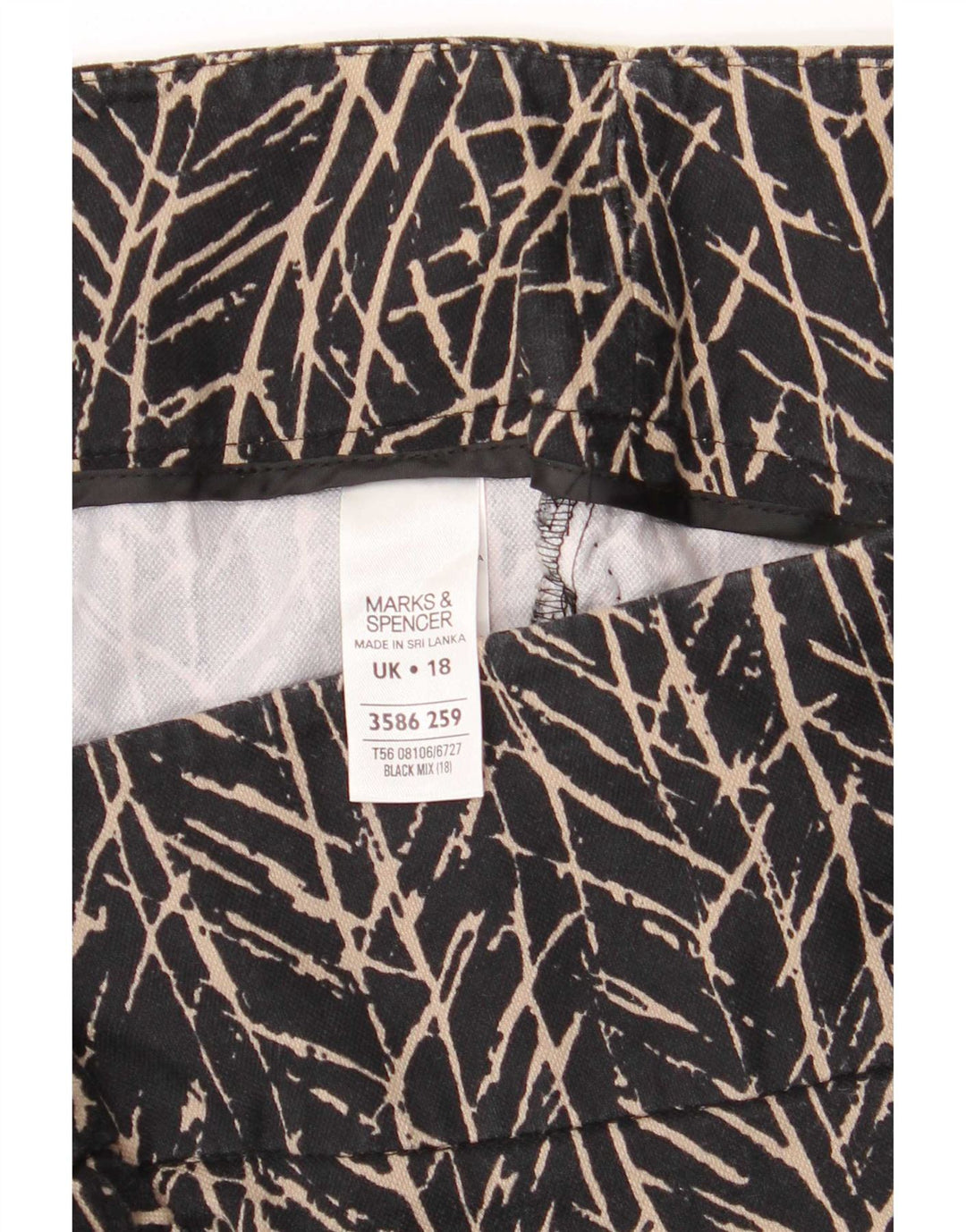 Saia lápis feminina Marks & Spencer com padrão abstrato Reino Unido 18 XL W38 preta