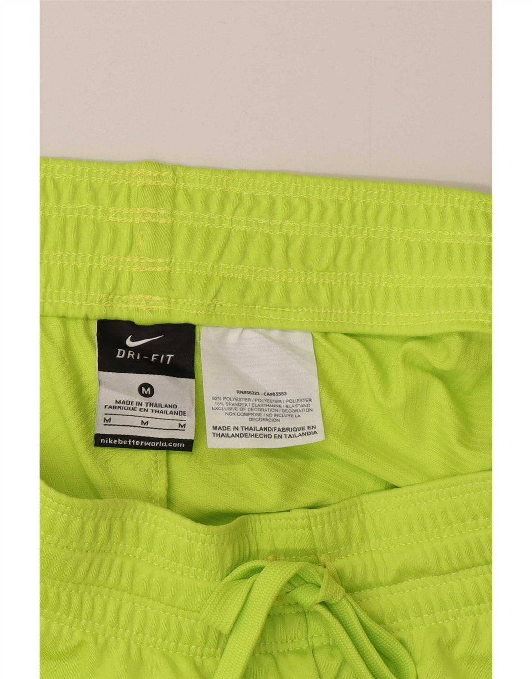 Shorts esportivos femininos Nike Dri Fit UK 14 poliéster verde médio