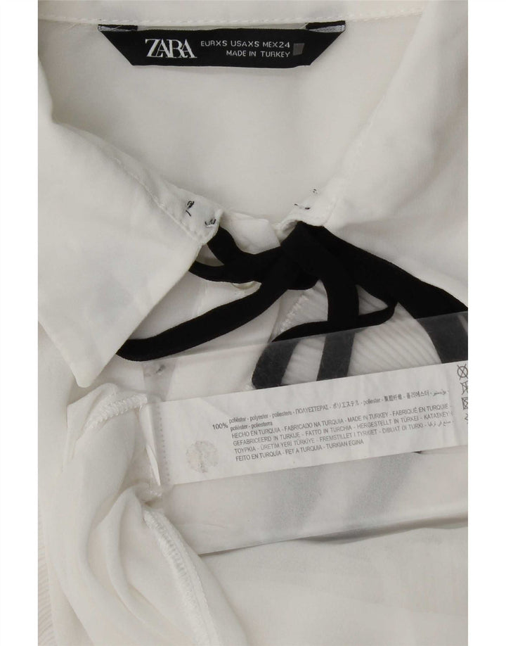Blusa feminina Zara com babados na frente e grande tamanho UK 6 XS poliéster branco