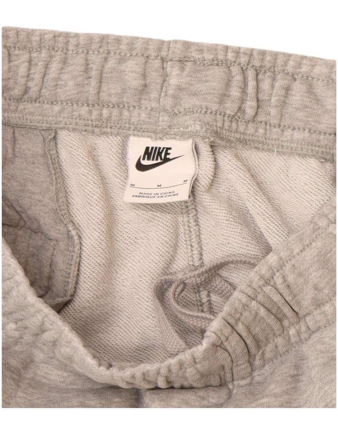 Calça de treino masculina Nike Joggers cinza médio algodão manchado