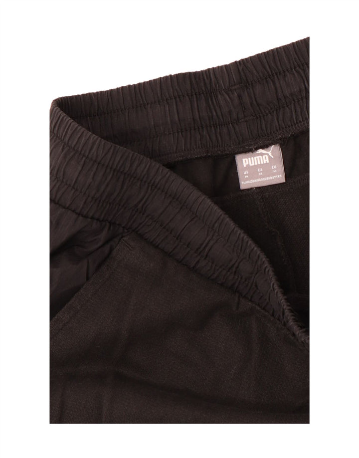 Calça de treino masculina Puma Graphic Joggers marrom médio