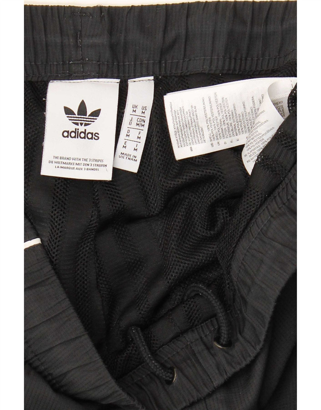 Calça de treino masculina Adidas Joggers médio preto colorblock poliéster