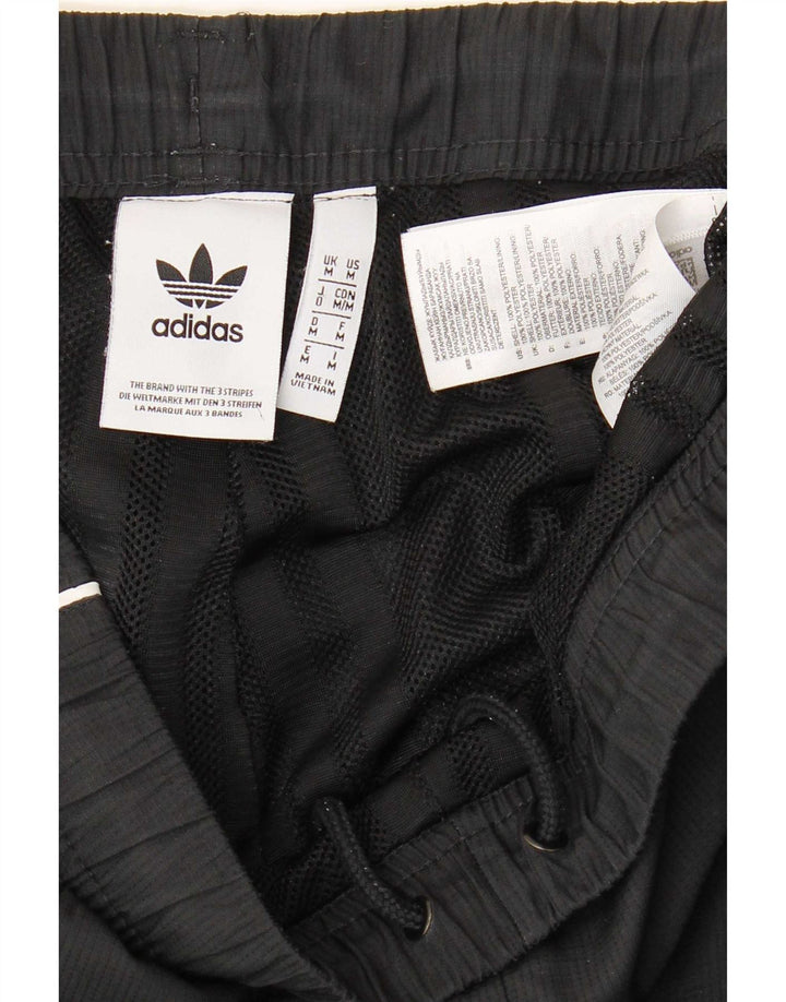 Calça de treino masculina Adidas Joggers médio preto colorblock poliéster